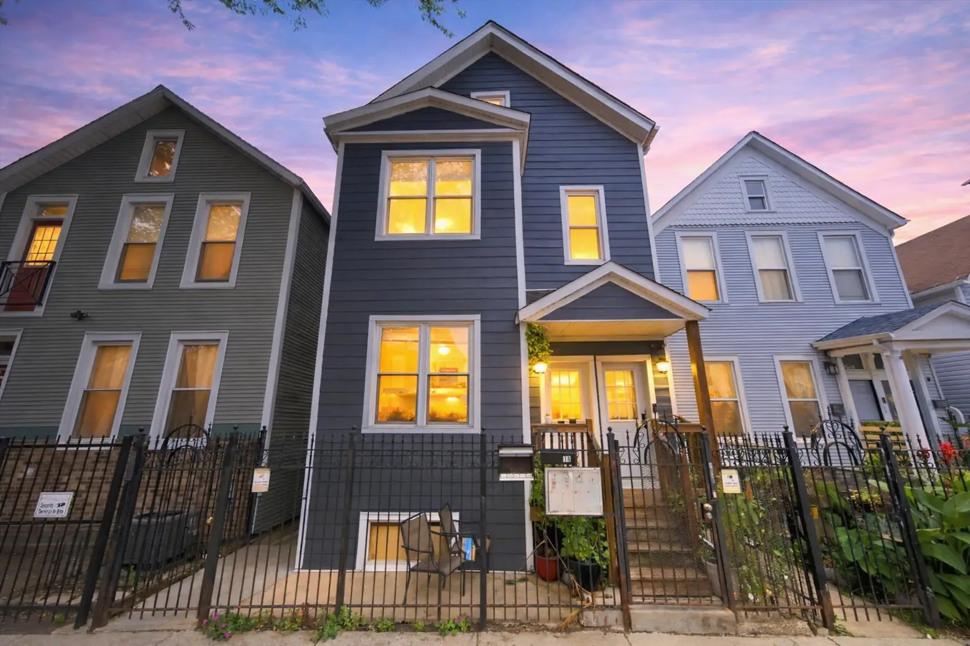 1626 North Washtenaw Avenue at dusk, a renovated four-unit building where Humboldt Park meets Logan Square