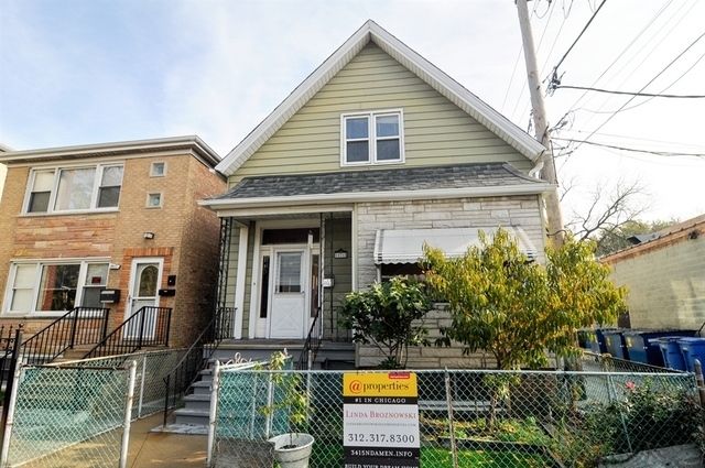 3415 North Damen Avenue before, 2017: a frame cottage