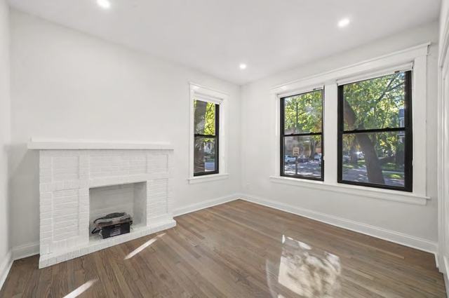 Renovated living room with fireplace