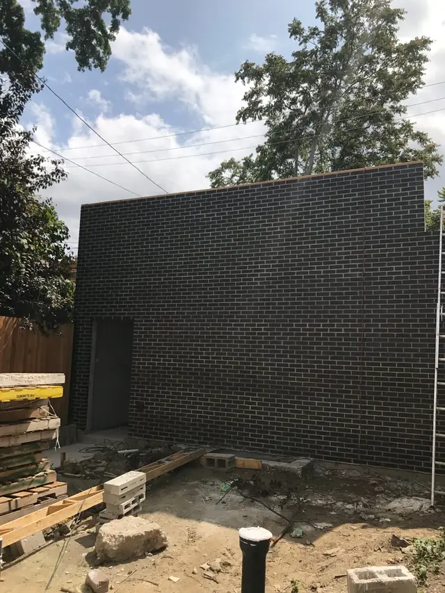 Garage masonry going up, 2017
