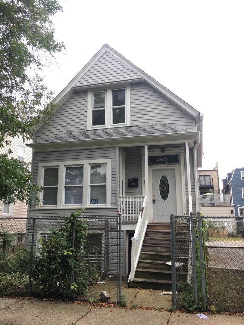 1754 North Troy Street before, 2018: a two-flat cottage