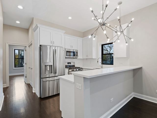 Kitchen with island after renovation